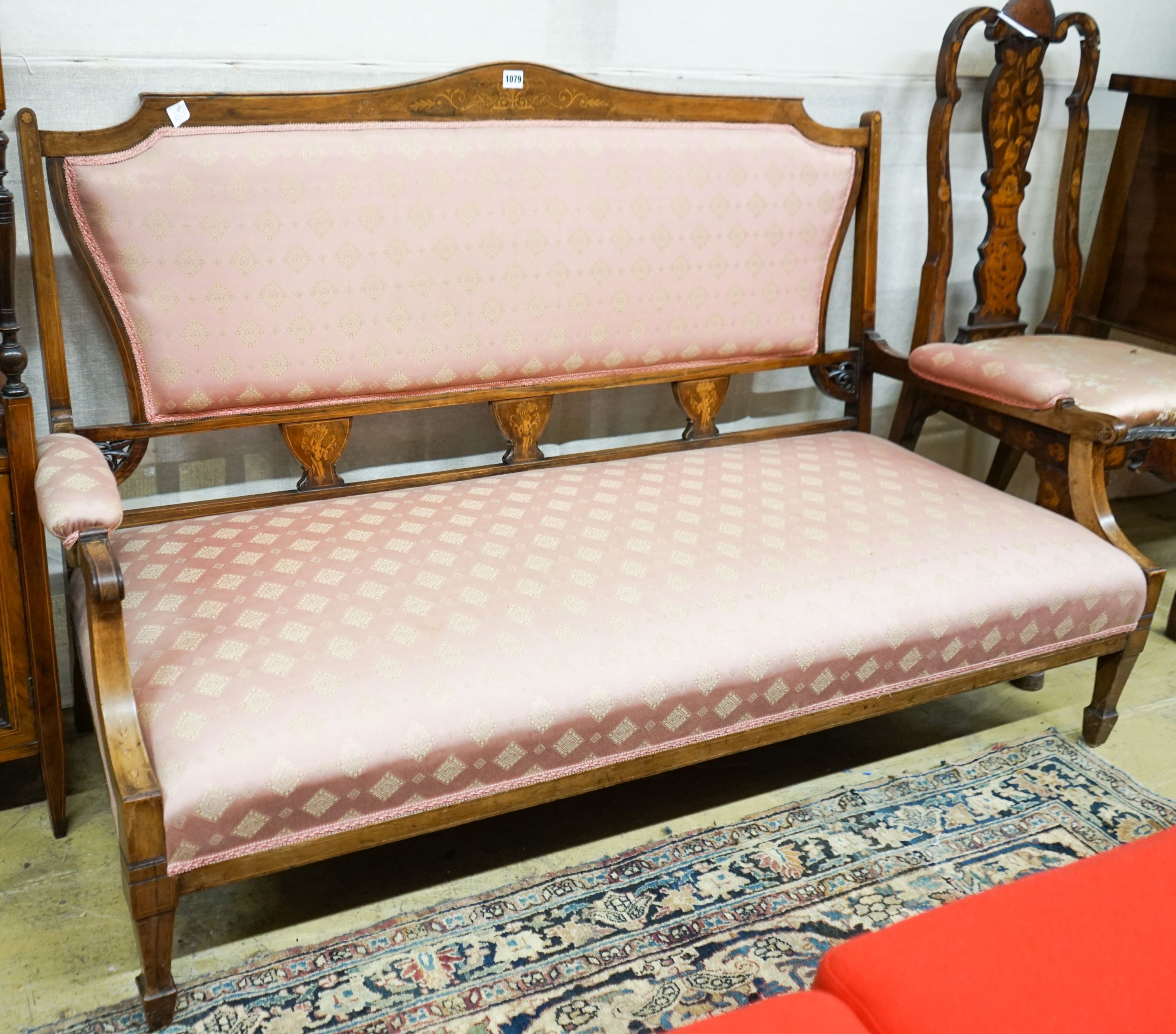 A late Victorian marquetry inlaid rosewood salon settee, length 144cm, depth 60cm, height 90cm